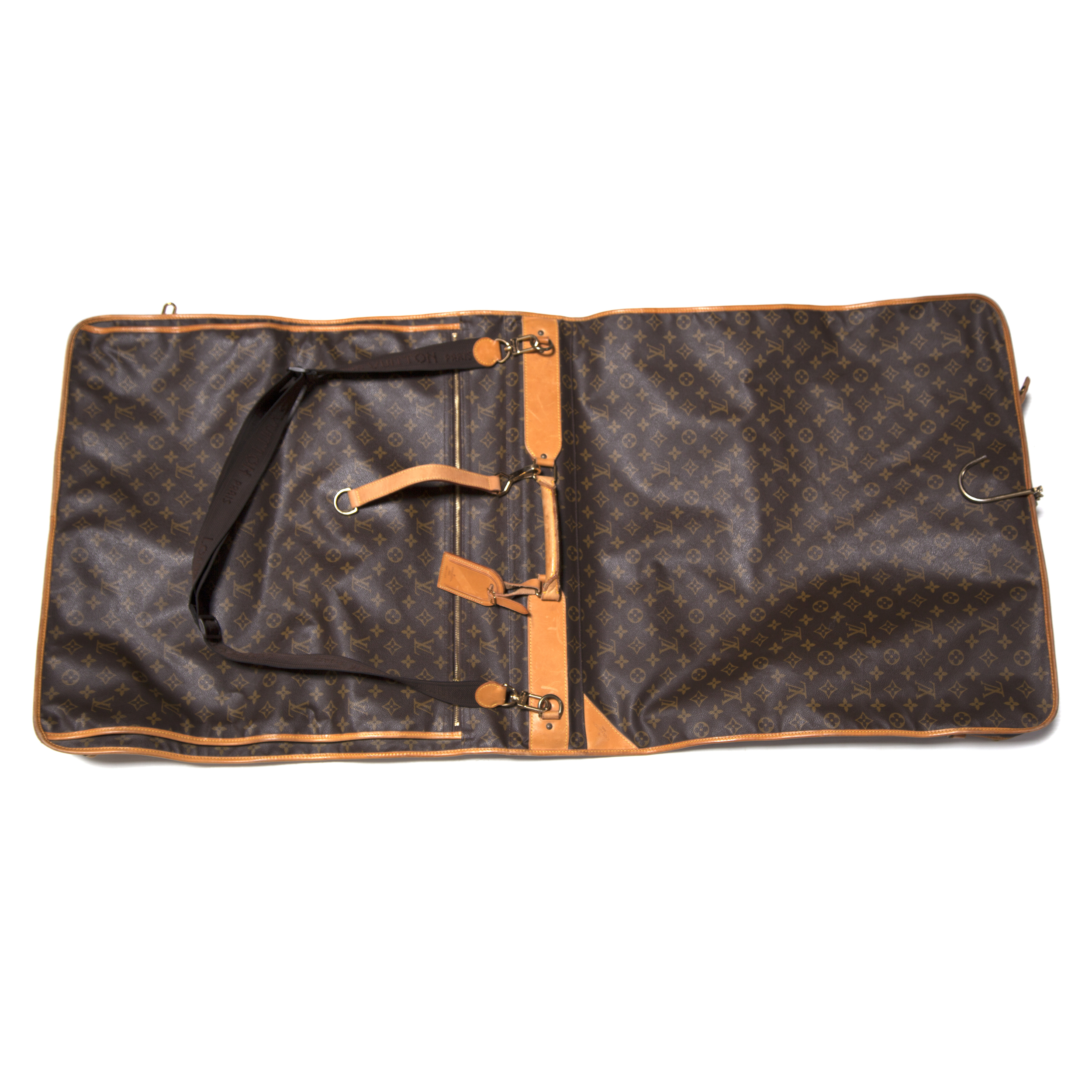 Louis Vuitton Bag Next To A Trash Bag